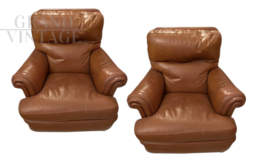 Pair of Poltrona Frau armchairs in brown leather