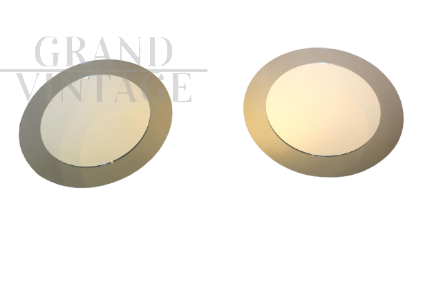 Pair of vintage style mirrors in the shape of a porthole