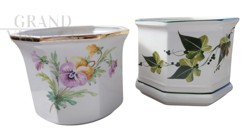 Pair of vintage ceramic vases with floral decorations