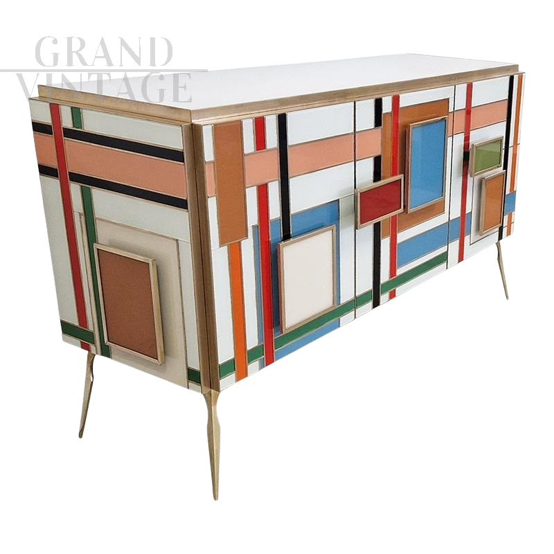Three-door sideboard in multicolored glass with mirrored interior