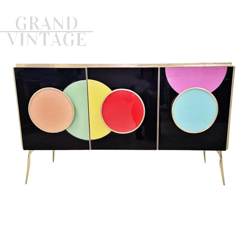 Three-door sideboard in black glass with colored circles     