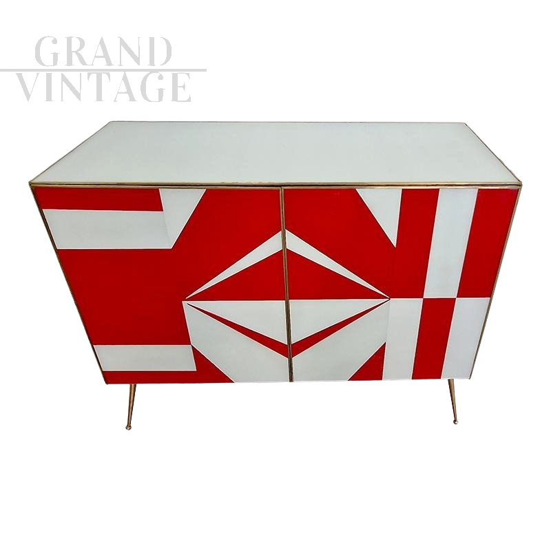 Sideboard with white and red glass geometries