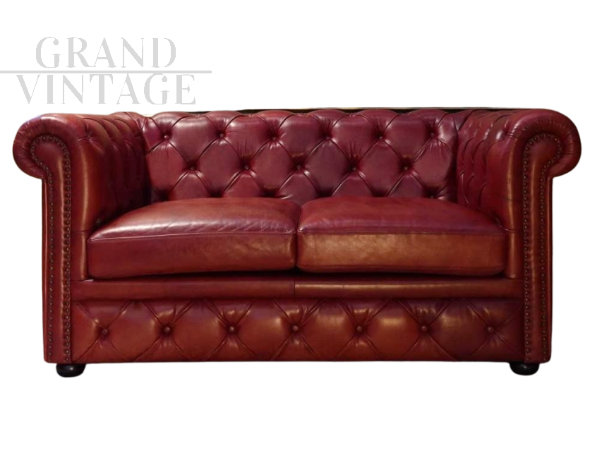 English red Chesterfield sofa