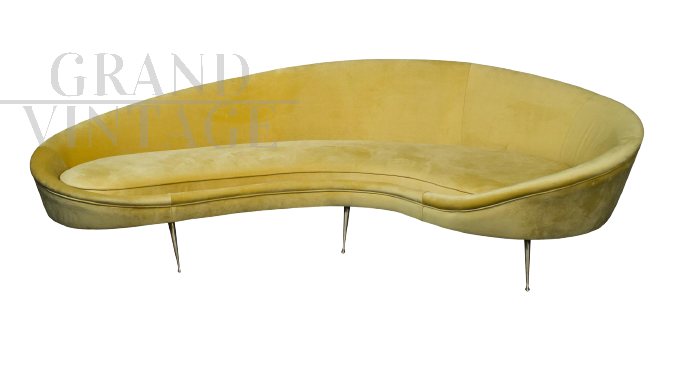 Vintage yellow sofa with a shaped line