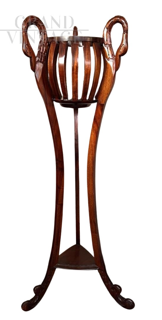 Art deco wooden plant stand with carved swans