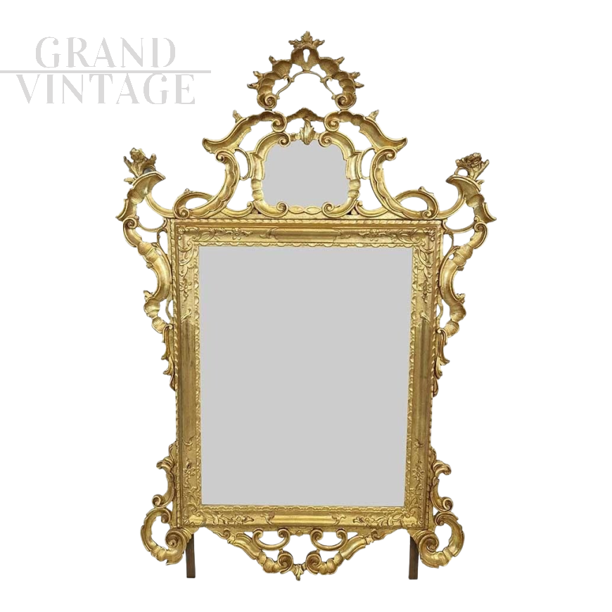 Large Louis XV mirror in carved and gilded wood, 18th century