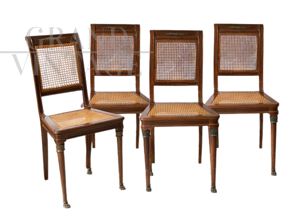 Group of four antique chairs in solid mahogany with bronze inserts                     
                            