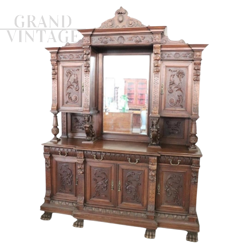 Imposing antique sideboard in carved solid walnut with mirror, 19th century