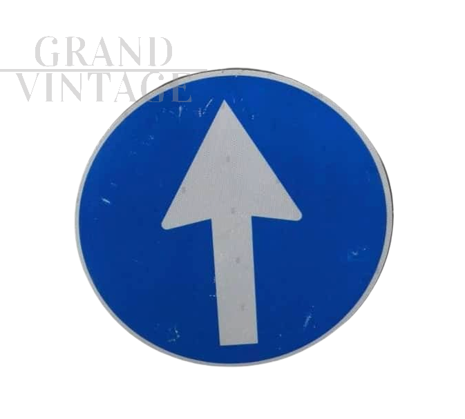 Vintage mandatory direction road sign, Italy 1990 
