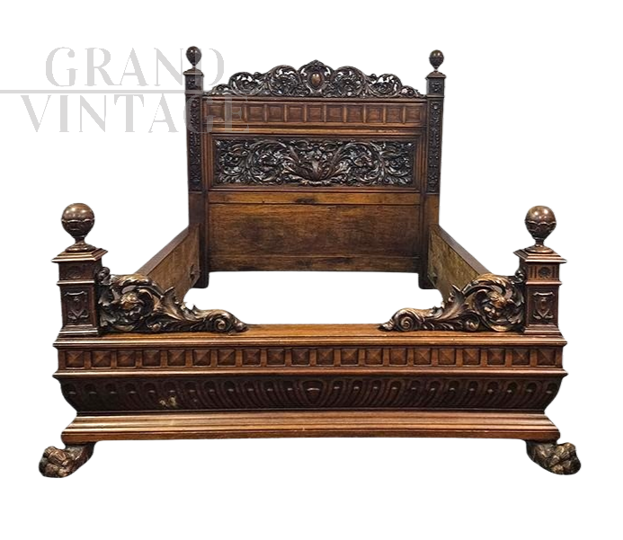 Antique carved wooden double bed