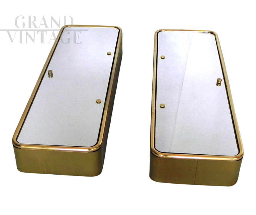 Pair of golden bathroom wall cabinets with mirror surface