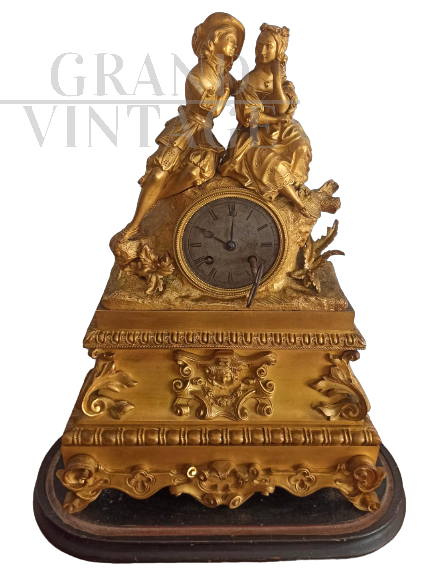Antique Parisian clock in mercury gilded bronze, 1800s