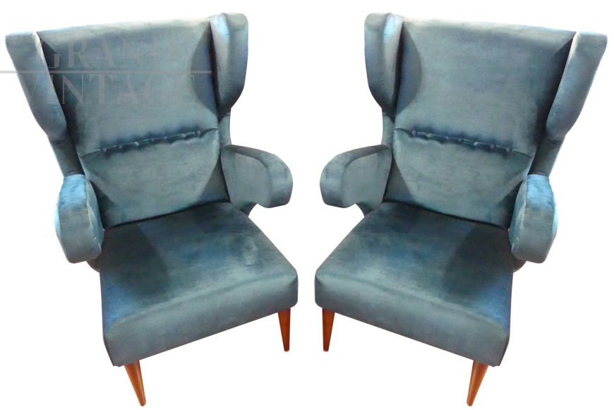 Pair of vintage wraparound armchairs in petrol blue velvet