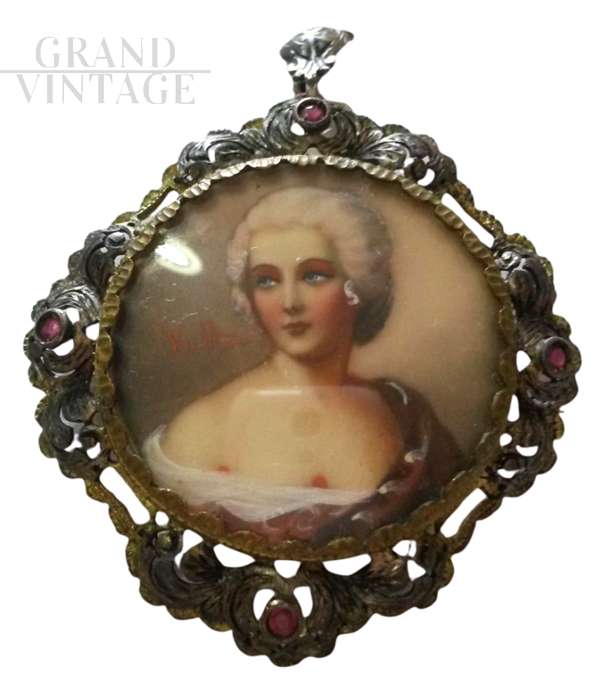 Liberty pendant or brooch in gold, silver and rubies with portrait of a lady  