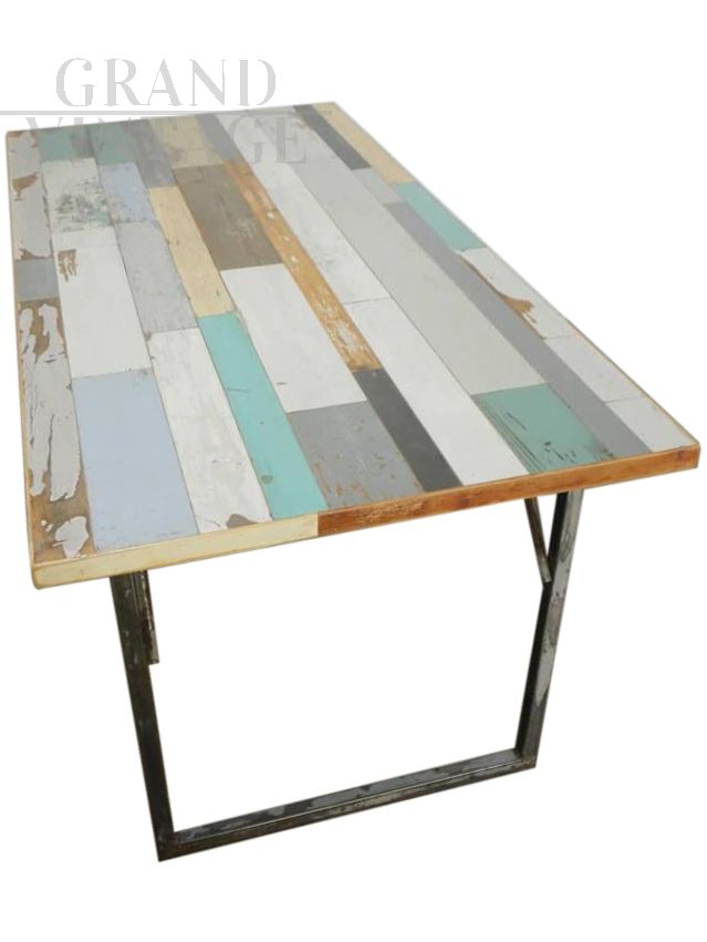 Industrial style table with patchwork wood top