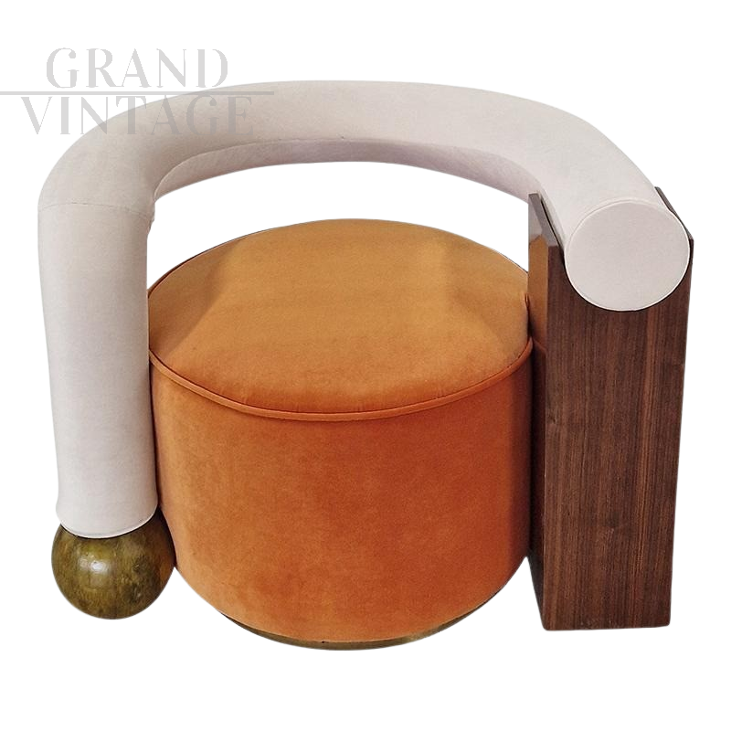 Asymmetric design armchair