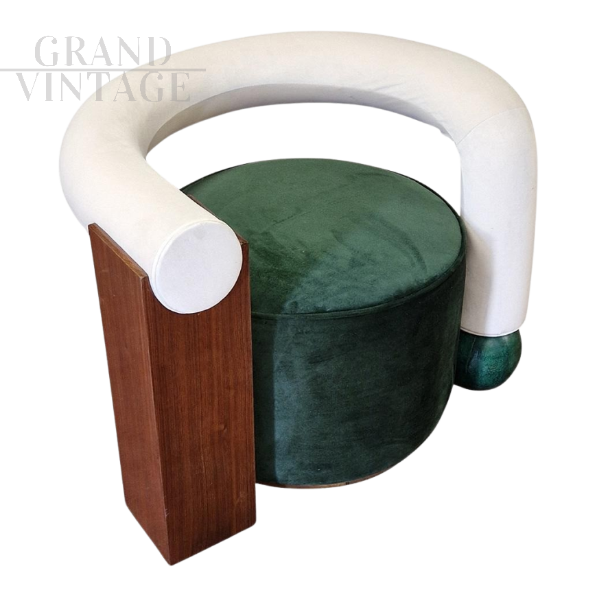 Asymmetric design armchair with geometric elements