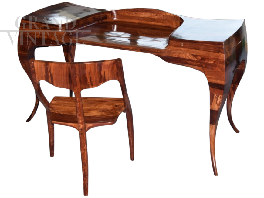 Rosewood desk with side compartments and three-legged chair