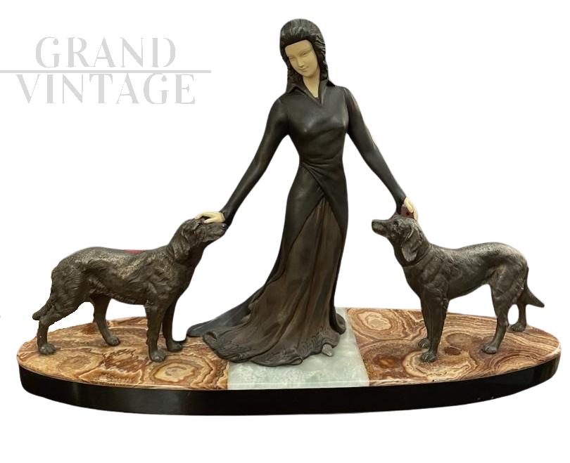 Jaques Limousin Art Deco sculpture depicting a lady between two dogs
                            