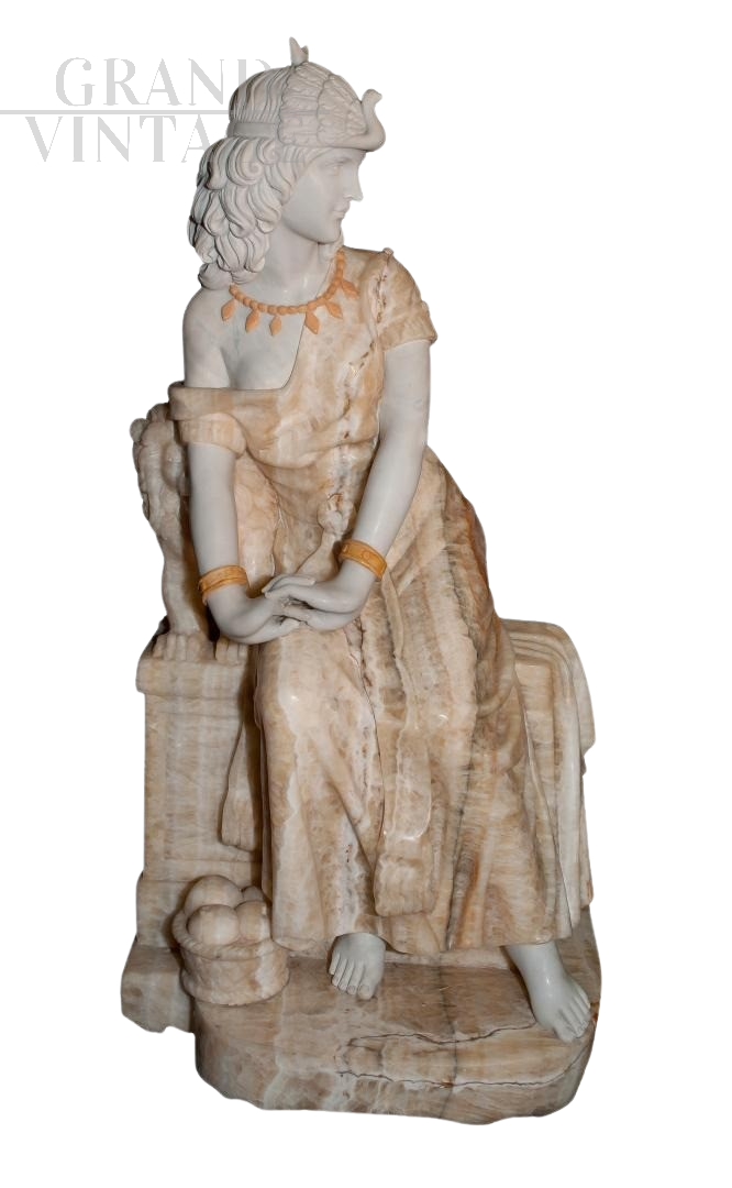 Marble sculpture depicting a young woman sitting