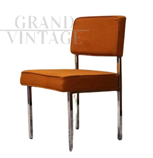 Vintage chair in metal and orange fabric