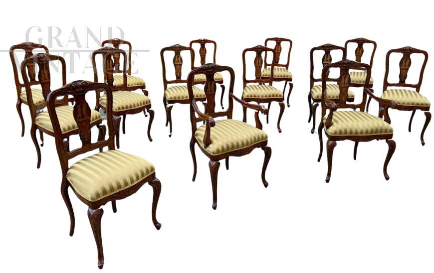 Set of 12 chairs + 2 head chairs in Palladian style inlaid with allegorical cherubs