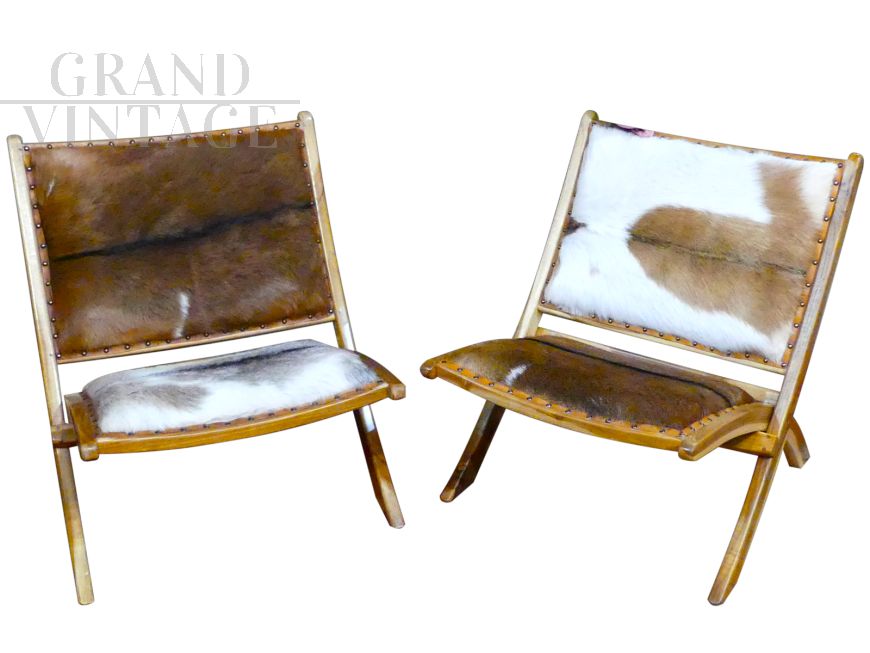 Folding armchairs in cow leather