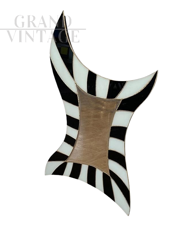 Shaped mirror in black and white glass with LED lighting