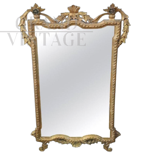 Antique style carved and gilded wooden mirror, early 1900s