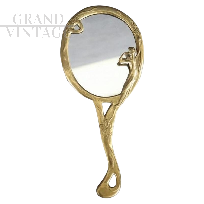 Hand mirror in golden brass, circa 1980s    