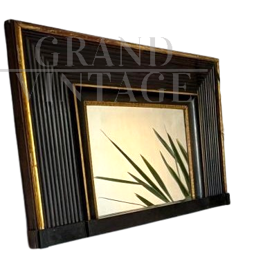 Antique Empire mirror, carved and lacquered in black and gold, Italy 19th century