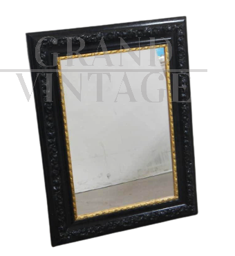 Vintage mirror with carved and black and gold lacquered frame, 1980s