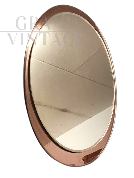 Vintage oval mirror on a pink background, Metalvetro 1970s