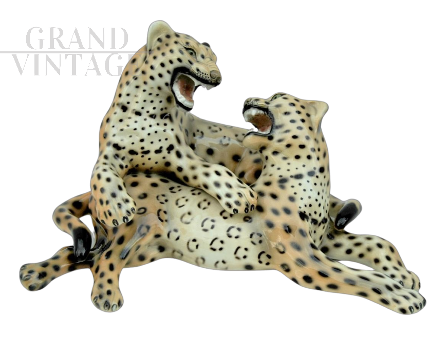 Vintage statue with a pair of leopards in glazed ceramic       