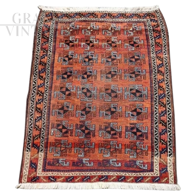 Vintage hand-knotted Baluch carpet from the first half of the 1900s, 105 x 150 cm