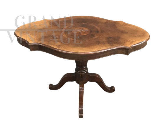 Antique oval biscuit coffee table from the 19th century