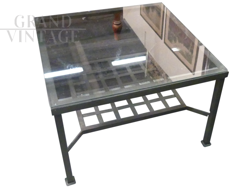 Industrial style coffee table with glass top