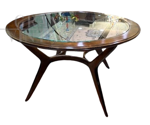 Mid-century round wooden table with glass top