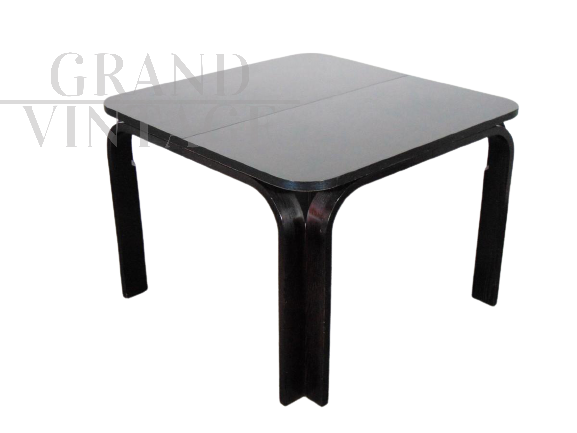 Design extendable table by Luigi Massoni