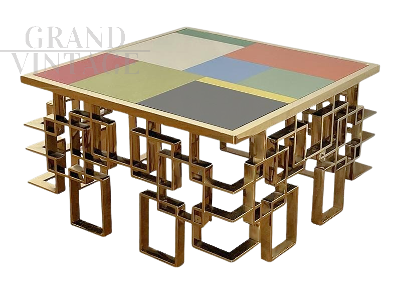 Low lounge table in chrome-gold steel with colored Murano glass top