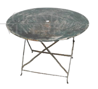 Vintage round green garden table from the 60s